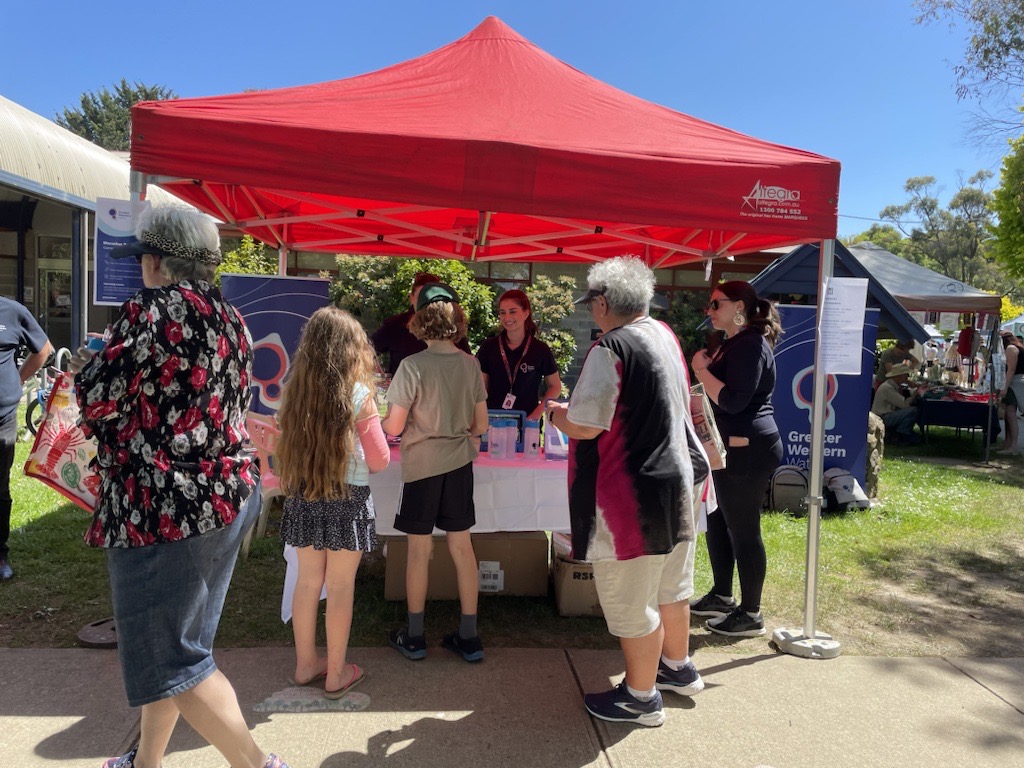 Greater Western Water employees greet Macedon Ranges community members. 