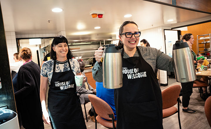 GWW Managing Director Maree Lang and Minister for Water Harriet Shing serve lunch to Melburnians experiencing homelessness and hardship.