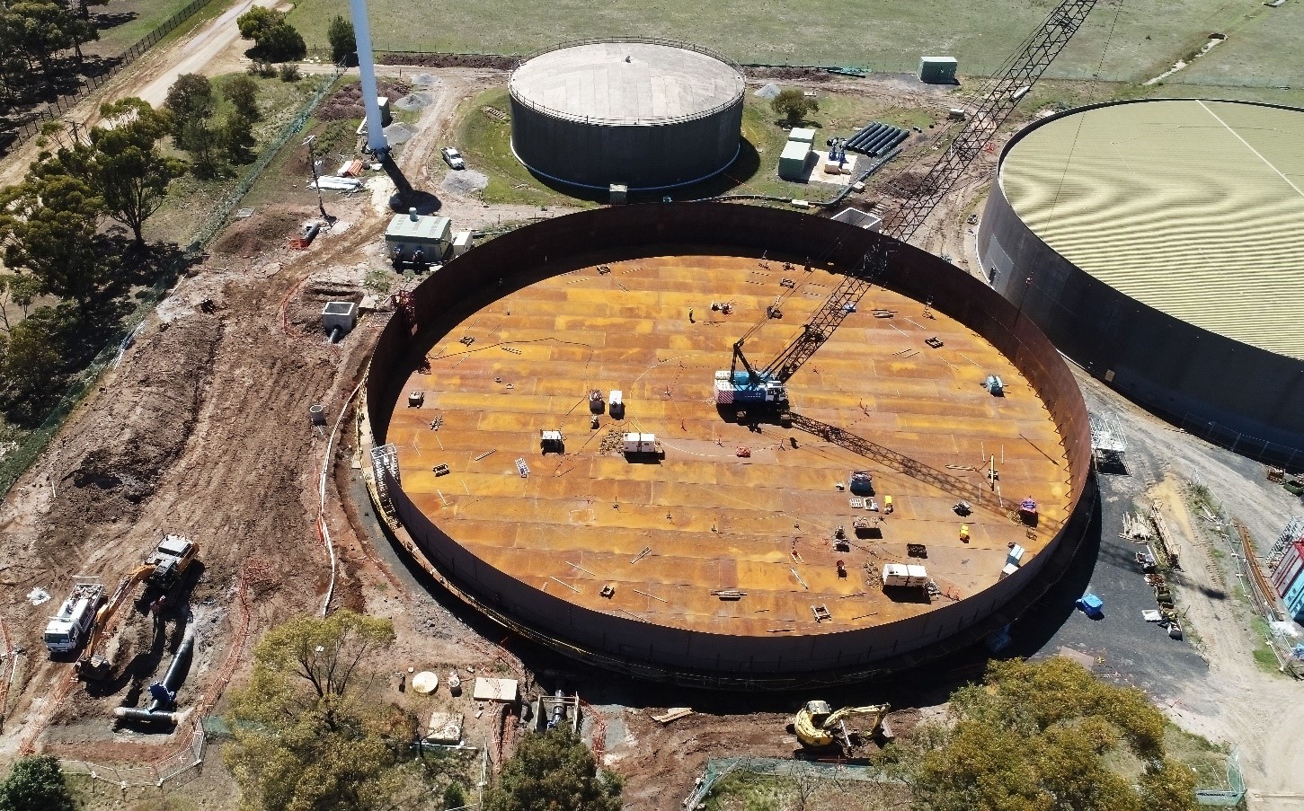 A large water tank that is under construction.