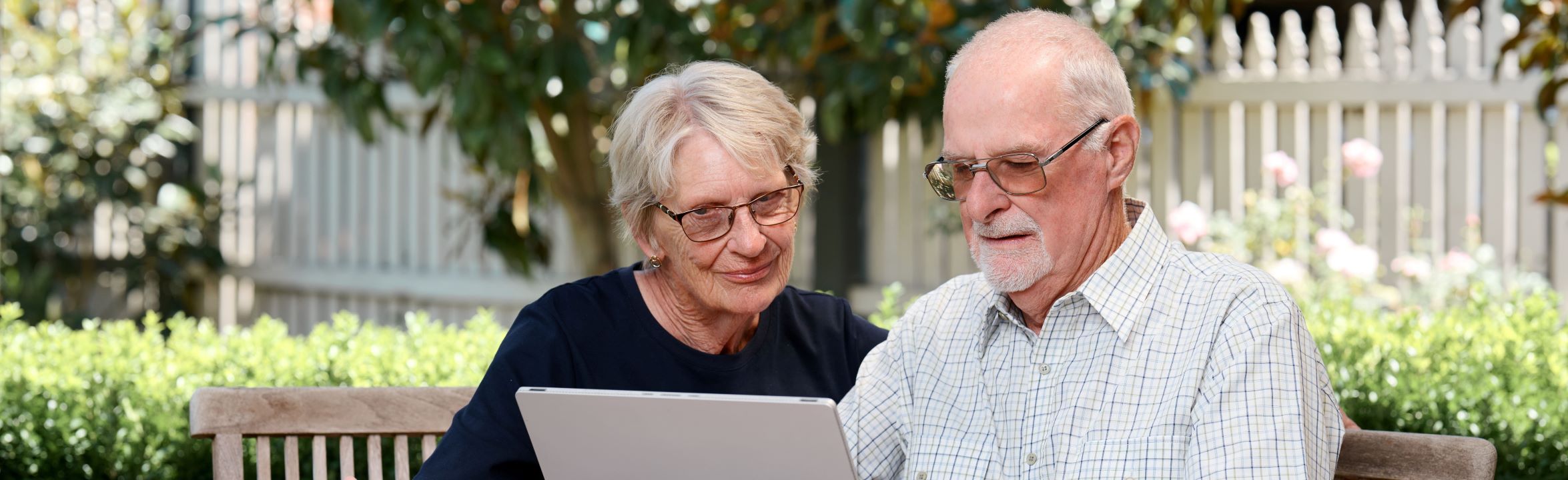 Couple looking at a laptop